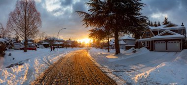 Residential Neighborhood in the Suburbs during a Dramatic Colorful Sunrise