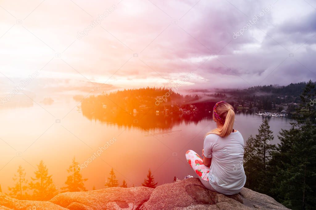 Adventurous Girl at the Lookout of a Famous Hike to Quarry Rock