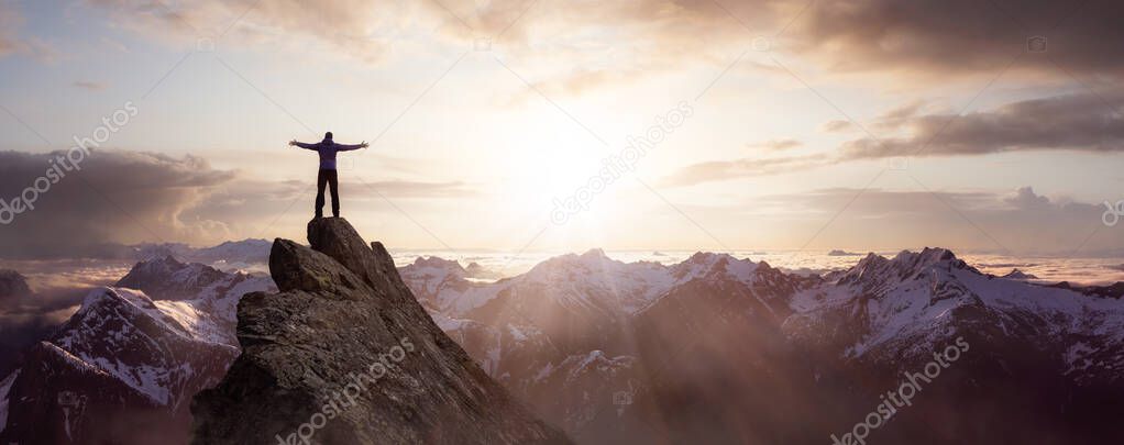 Magical Fantasy Adventure Composite of Man Hiking on top of a rocky mountain peak