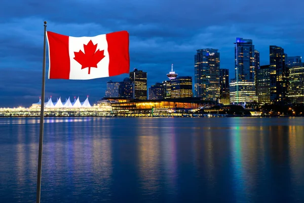 National Canadian Flag with Modern Downtown City in Background — стокове фото