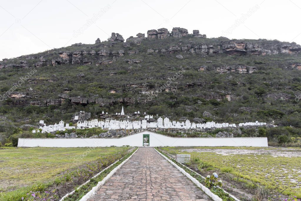 Beautiful view to white byzantine style tomb stones on mountainside in Santa Izabel Cemetery, Mucug, Chapada Diamantina, Bahia, Brazil