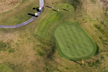Yaşam tarzı, bir golf sahasında golf