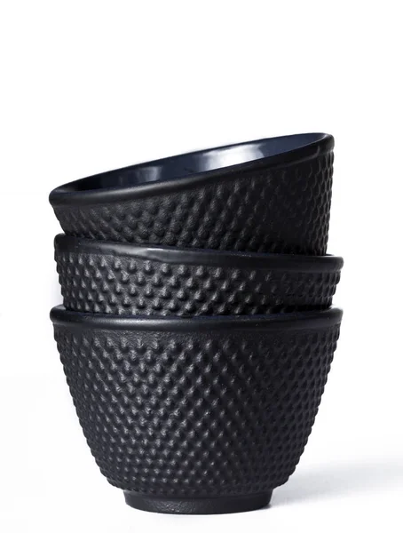 Tea cup of black cast iron — Stock Photo, Image