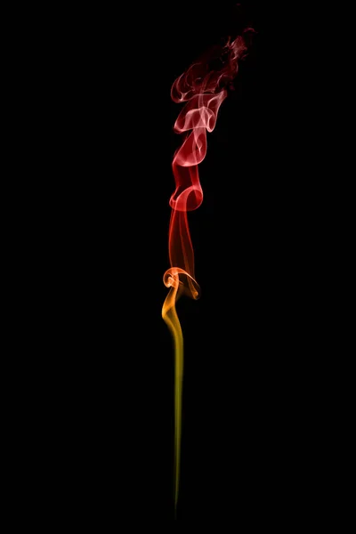 Colorful smoke isolated on a black background — Stock Photo, Image