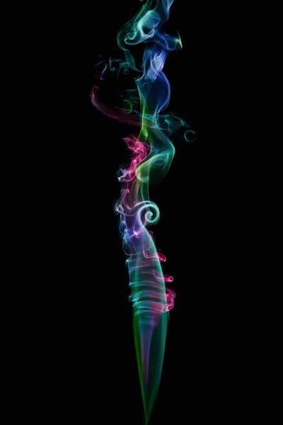 Fumée colorée isolée sur fond noir — Photo