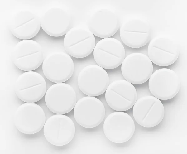 Concepto médico o tema con píldoras fondo blanco. Vista superior — Foto de Stock