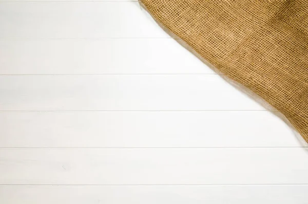 Біла, дерев'яна текстура підлоги з фоном з джутової тканини — стокове фото