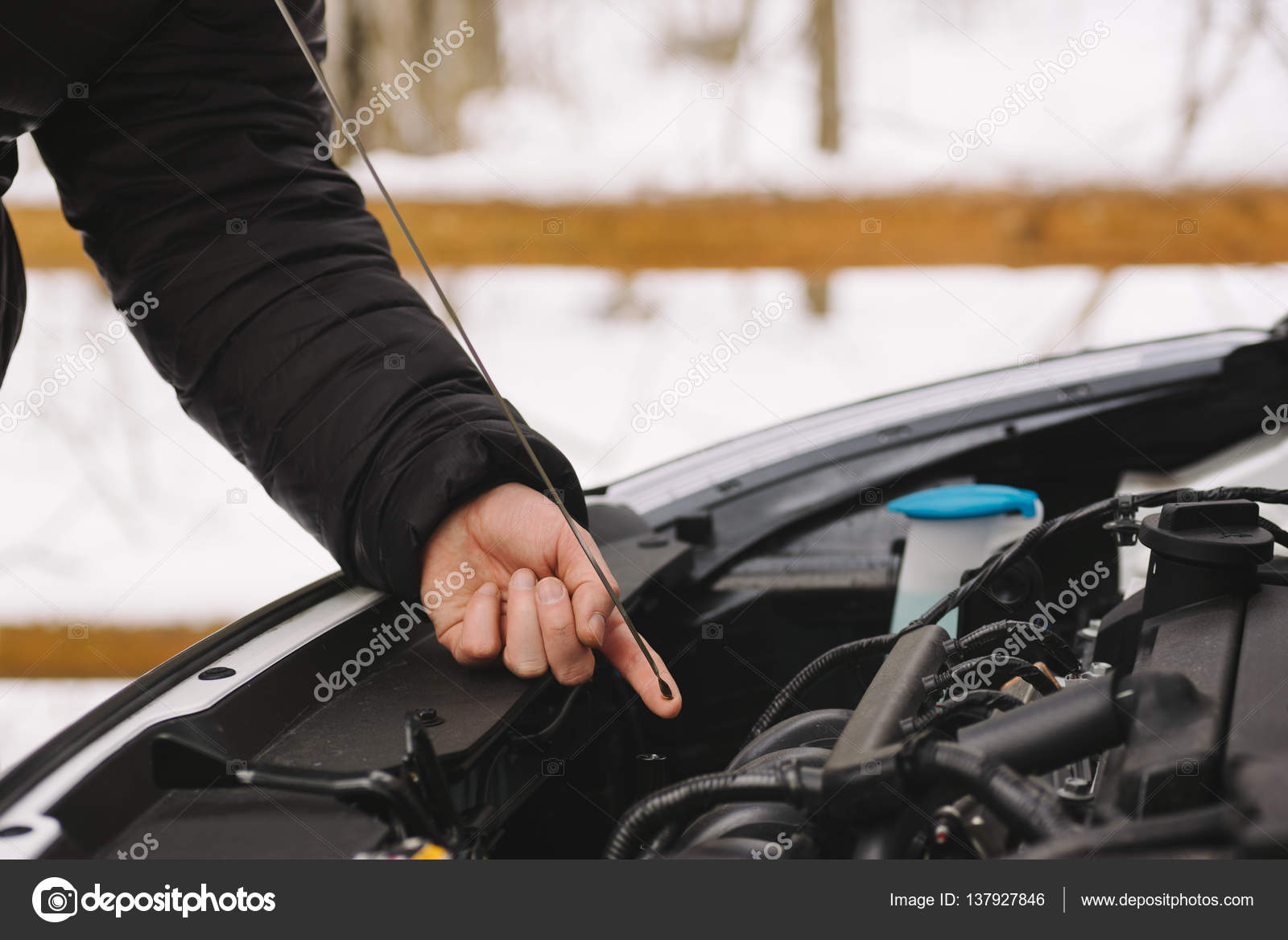 Man Pouring Car Winter Windshield Washer Fluid Stock Photo
