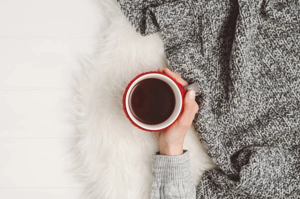 Hand holding cup of tea. Top view with copy space — Stock Photo, Image