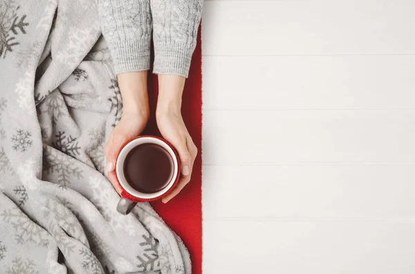 Hand holding cup of tea. Top view with copy space — Stock Photo, Image