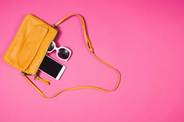 Flat lay photo of womans accessories flat lay, colorful background