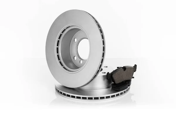Car or automotive brake pads and discs on white background — 스톡 사진