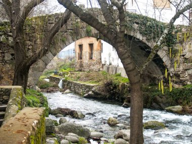 Stone bridge on Jewish neighborhood in Hervas, Spain clipart