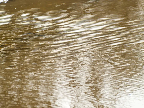 Textura de ondas em água tranquila — Fotografia de Stock