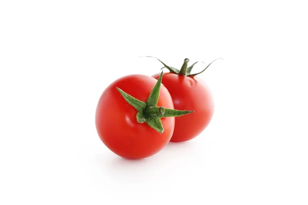 Tomater körsbär på vit bakgrund — Stockfoto
