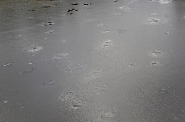 Footprints in a bumpy ice on a frozen lake
