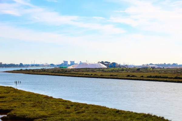 Beautiful landscape of salt mine and salt pans in coast of Huelva with Mountain of salt, Andalusia, Spain.