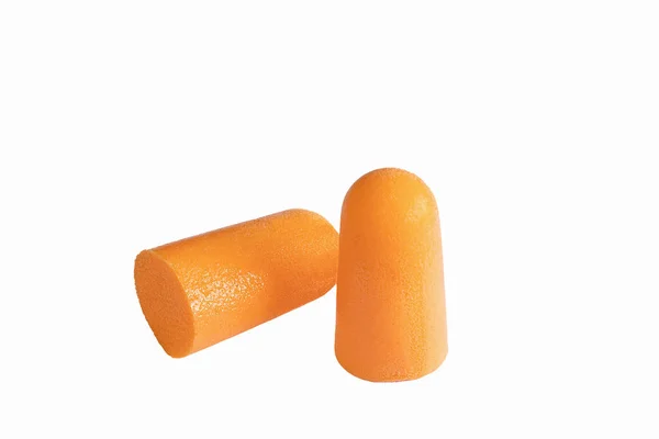 白色の背景に隔離されたオレンジ色の耳栓 — ストック写真