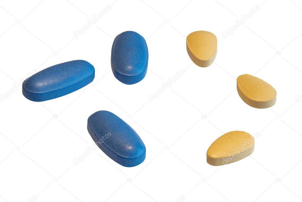 Blue and yellow Pills on white background