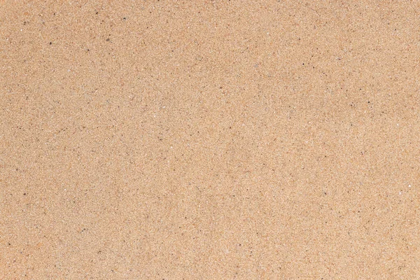 Plajın arka planında kum var. Üst görünüm