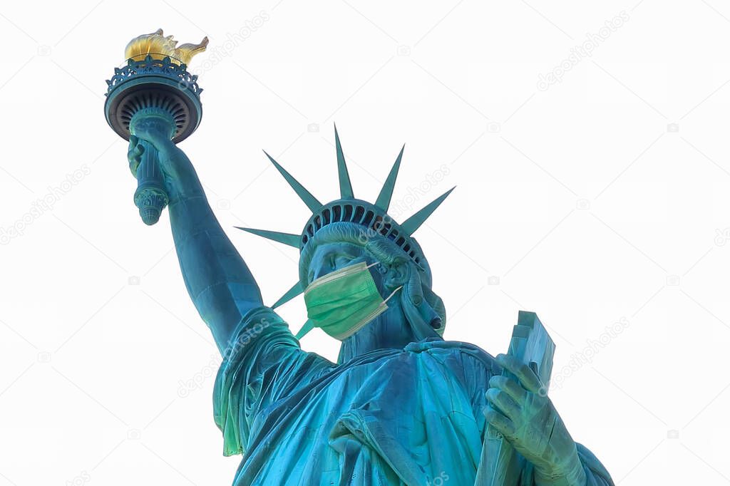 Statue of Liberty with a protective medical mask isolated on white. COVID-19 coronavirus quarantine