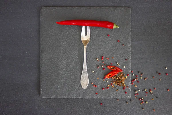 stock image Red pepper on a fork. Sharp spices