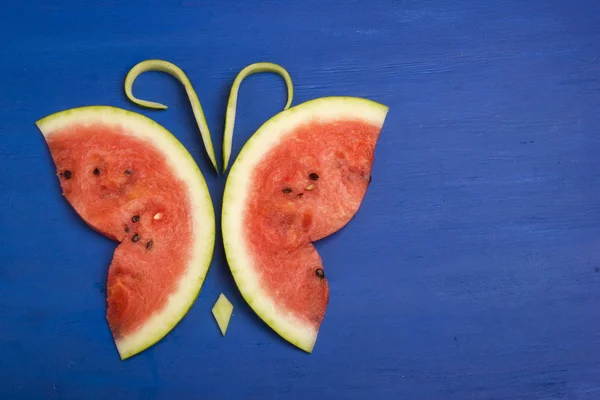 Butterfly is made of pieces of watermelon — Stock Photo, Image