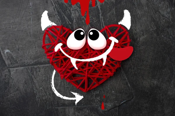 Red heart with a horn and tail of the devil Theme for Valentine\'s Day. Wedding, love 2