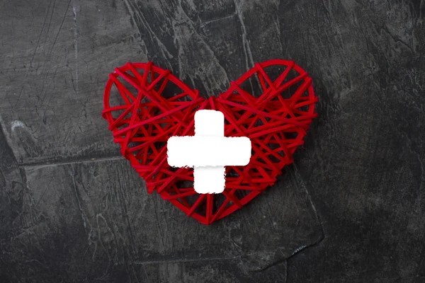 Heart with cross icon. Healthcare, Medical symbol. Doctor day sign, emblem on a dark background 1