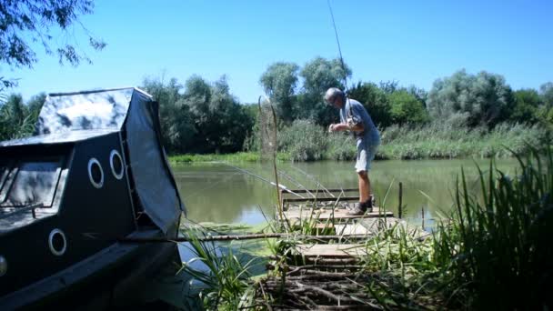 Fisherman casting the hook — Stock Video