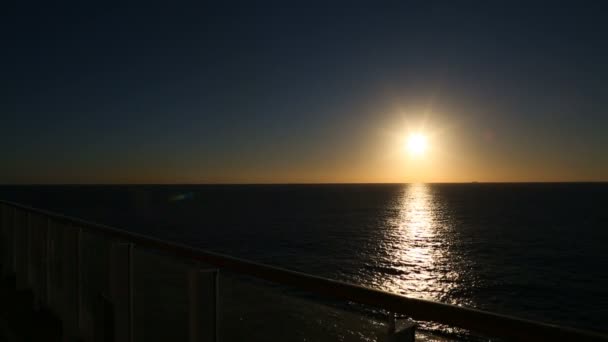 Mix of 2 shots, sun sets on the horizon — Stock Video