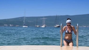 kadın denizden oluyor