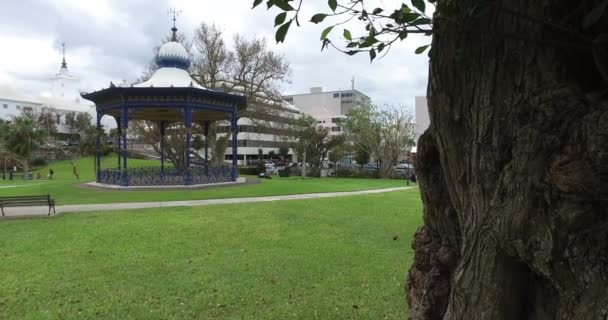 Beautiful park with awning and pathway — Stock Video