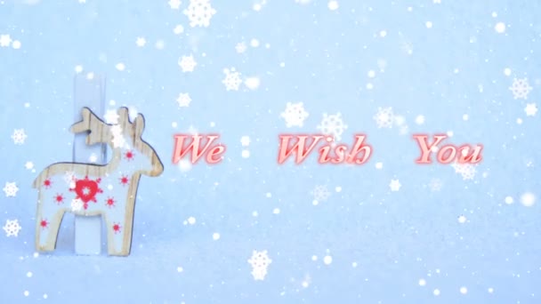我们祝愿您一个愉快的圣诞节和新年快乐文本 装饰木驯鹿在蓝色背景 — 图库视频影像