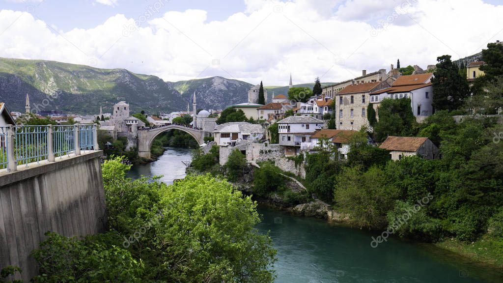 Panoramic view of the historic town of Mostar with famous Old Bridge (Stari Most), a UNESCO World Heritage Site since 2005, Bosnia and Herzegovina.