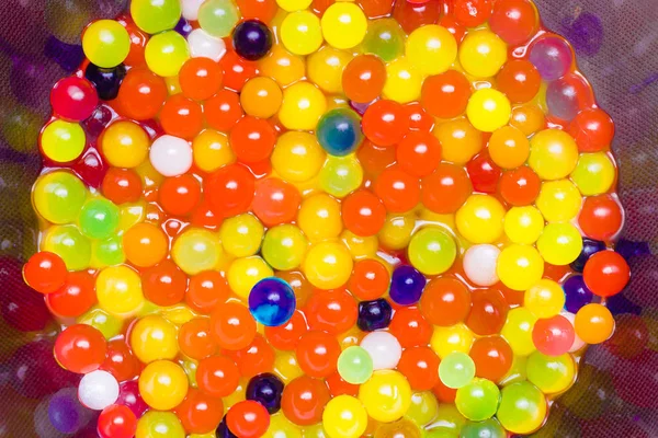 Magic growing colorful jelly balls — Stock Photo, Image