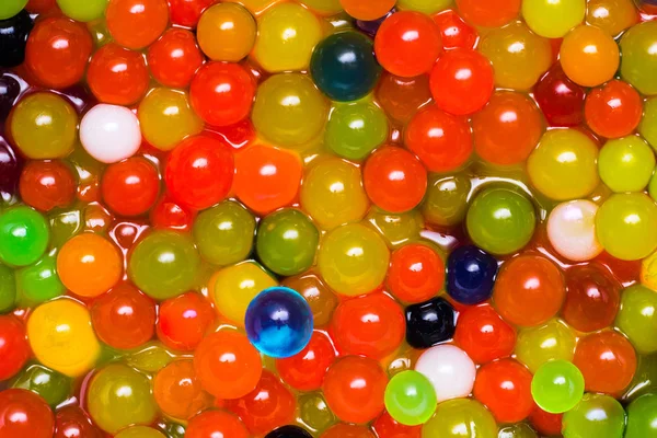 Magisch groeiende ballen van de kleurrijke gelei — Stockfoto