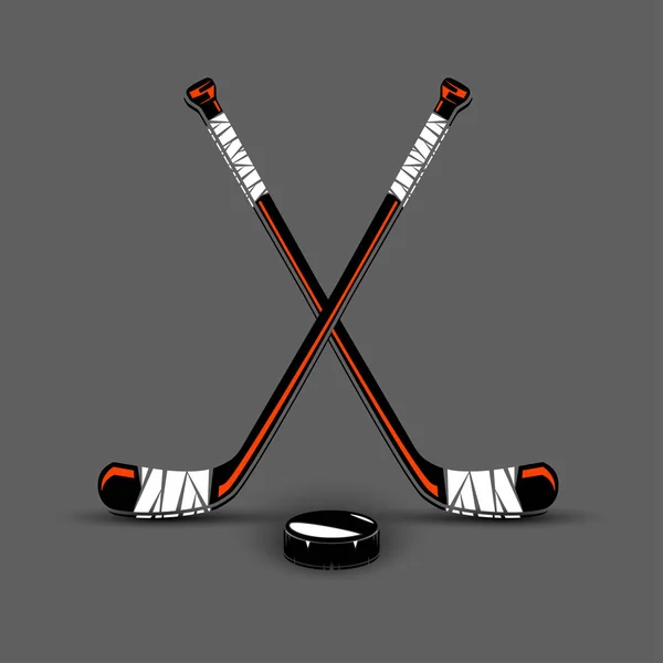 Hokejové hole a puk — Stockový vektor