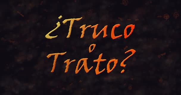 Truco o Trato (Trick or Treat) Spaanse tekst oplossend in stof van links — Stockvideo