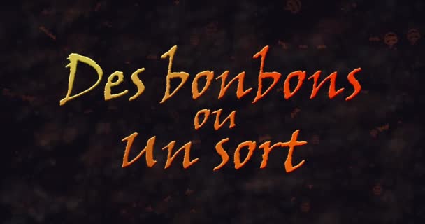 Des bonbons uo FN sortera (Trick or Treat) franska texten upplösning i damm från botten — Stockvideo