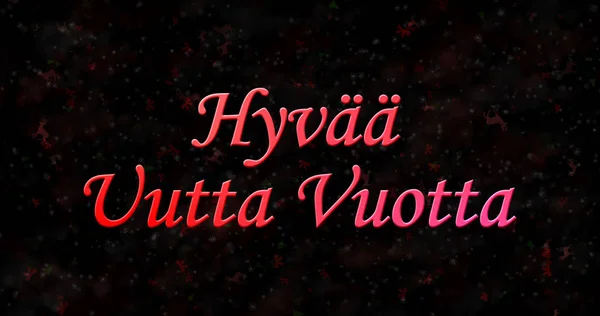 Счастливый Новый год текст на финском языке «Hyvaa uutta vuotta» на черном bac — стоковое фото