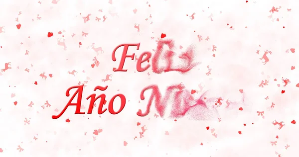 Felice anno nuovo testo in spagnolo "Feliz ano nuevo" si trasforma in polvere da destra su sfondo bianco — Foto Stock