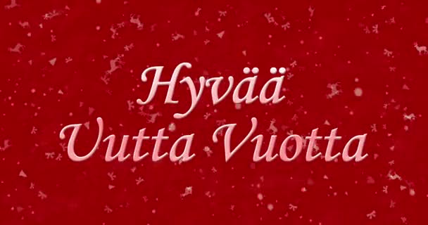 Gott nytt år text på finska "Hyvaa uutta år" bildas från damm och vänder sig till damm horisontellt på röd animerad bakgrund — Stockvideo