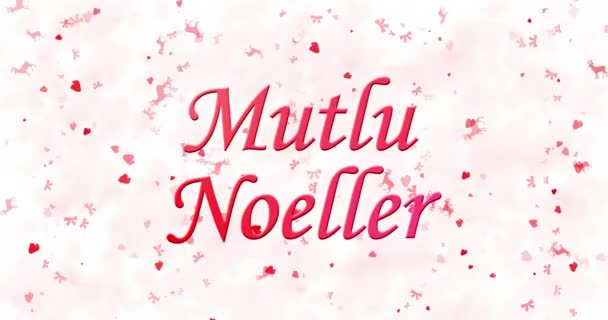 Feliz texto de Natal em turco "Mutlu Noeller" transforma-se em pó de baixo em fundo animado branco — Vídeo de Stock