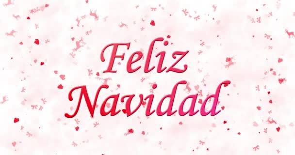 Feliz Natal texto em espanhol "Feliz Navidad" transforma-se em poeira de baixo em fundo animado branco — Vídeo de Stock