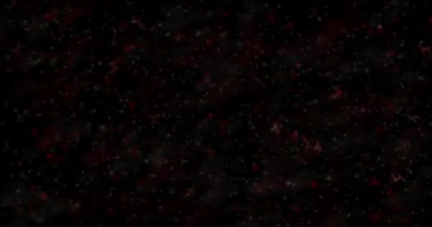 Щасливий різдвяний текст, сформований з пилу і перетворюється на пил горизонтально на чорному анімованому фоні — стокове відео