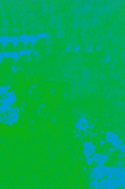 Açık mavi benekli koyu yeşil renk soyut arkaplan. Eski çatlak boya deseni, çatlayan doku.