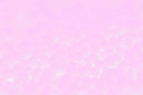 Pastel pink and white abstract background with balls pattern