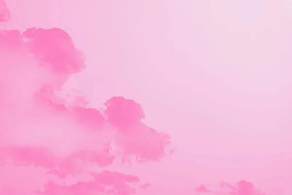 Pastel pink sky background with pink clouds. Pink watercolor sky abstract background