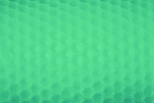 Vivid green color abstract background, honey comb pattern